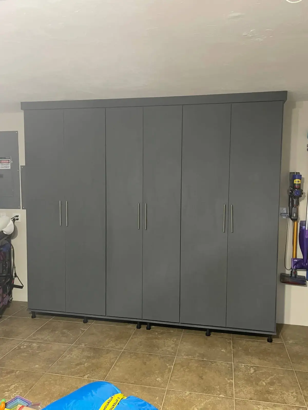 Tall grey garage storage cabinets custom-installed by C&C Multiservices in Connecticut
